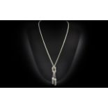A Fine Quality Ladies Sterling Silver Necklace / Chain with Knot and Double Tassel Drop Design.