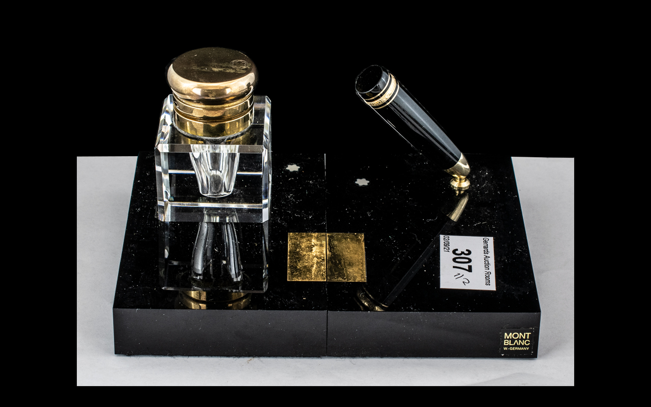 Mont Blanc Desk Set, comprising a crystal glass ink pot with a brass lid engraved Mont Blanc,