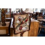 Victorian Carved Walnut Pole Screen of fine quality, with an embroidered panel depicting a male