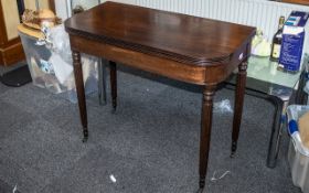 Antique Mahogany Console Table, raised on four column legs with casters.