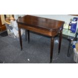 Antique Mahogany Console Table, raised on four column legs with casters.