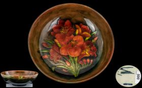 William Moorcroft Signed Large and Impressive Flambe Glazed Footed Bowl ' Friesia ' Design. c.