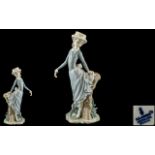 Lladro - Hand Painted Porcelain Figure ' Young Girl ' In Summer Dress, Standing By a Tree Stump.