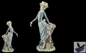 Lladro - Hand Painted Porcelain Figure ' Young Girl ' In Summer Dress, Standing By a Tree Stump.