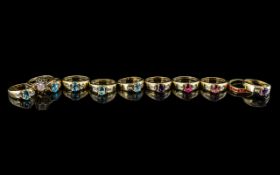 A Collection of Eleven Silver Gilt Rings