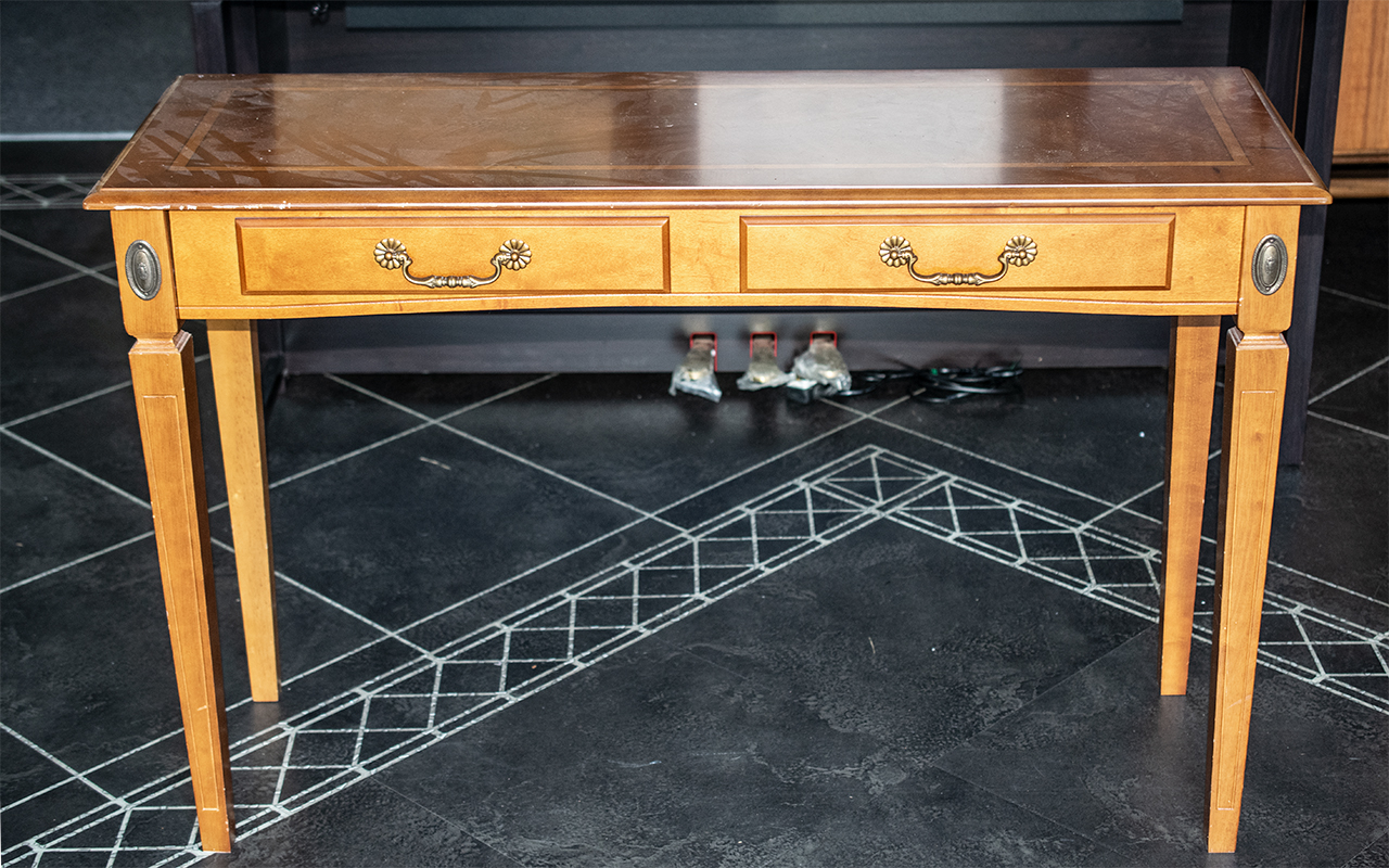 A Yew Wood Console Table with tapering l