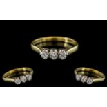 18ct Gold Attractive 3 Stone Diamond Set Ring. The Round Brilliant Cut Diamonds of Good Sparkle.