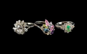 Three Silver Dress Rings, all marked 925 silver, set with coloured stones in cluster style.