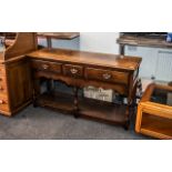 Oak Dresser of small size, in the Georgian style, made by Titchmarsh & Goodwin of Ipswich,