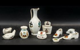 Collection of Souvenir Porcelain, comprising a Goss See of Norwich jug, Willow Art Morecambe shoes,