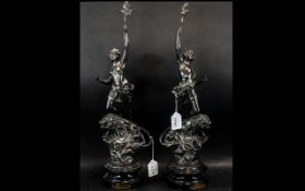 Two Spelter Figures titled 'Le Force' and 'Le Pouvoir', approx height 20", on wooden bases.