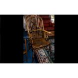 Reproduction Hoop-Backed Windsor Armchair with a fretted lyre shaped splat,