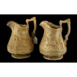 Pair of Biscuit Moulded Pottery Jugs by Ridgeway & Company, published 1845.