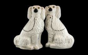 A Large Pair of Staffordshire Spaniels, each measured 16" tall. A/F.