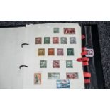 Black Two Ring Stamp Album with superb collection of British Commonwealth stamps.