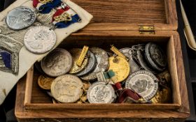 Carved Hinged Wooden Box Containing A Quantity Of Commemorative Medals/Medallions