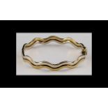 Ladies - Attractive Modern 9ct Gold Hinged Bangle ' Waves ' Design. Marked 375 - 9ct.