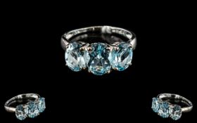 Sky Blue Topaz Trilogy Ring, size Q, 5cts of topaz over three oval cut stones,