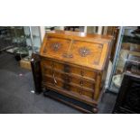 Jacobean Style Edwardian Oak Fall Front Bureau, with a fitted interior.