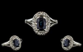 Ladies 18ct White Gold Attractive Diamond and Sapphire Set Cluster Ring.