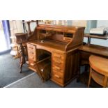 Golden Oak 'S' Shaped Shuttered Front Roll-Top Desk, by the Lebus Company.