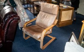 Designer Bentwood Danish Armchair covered in a tan leather loose back and seat covering.