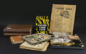 Box of Miscellaneous Books Stamps Etc. comprising Tyneside Songs, Manchester United Book,