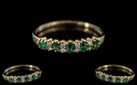 Ladies - Attractive Channel Set Emerald and Diamond Set Ring. Full Hallmark for 9.375.