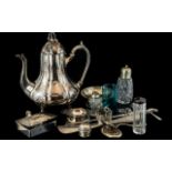 A Small Mixed Lot to include a silver handled boot hook and shoe horn, a silver infuser,