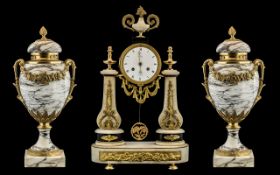 Late 19th Century Three Piece French White Marble and Ormolu Clock Set, the enamelled dial clock,