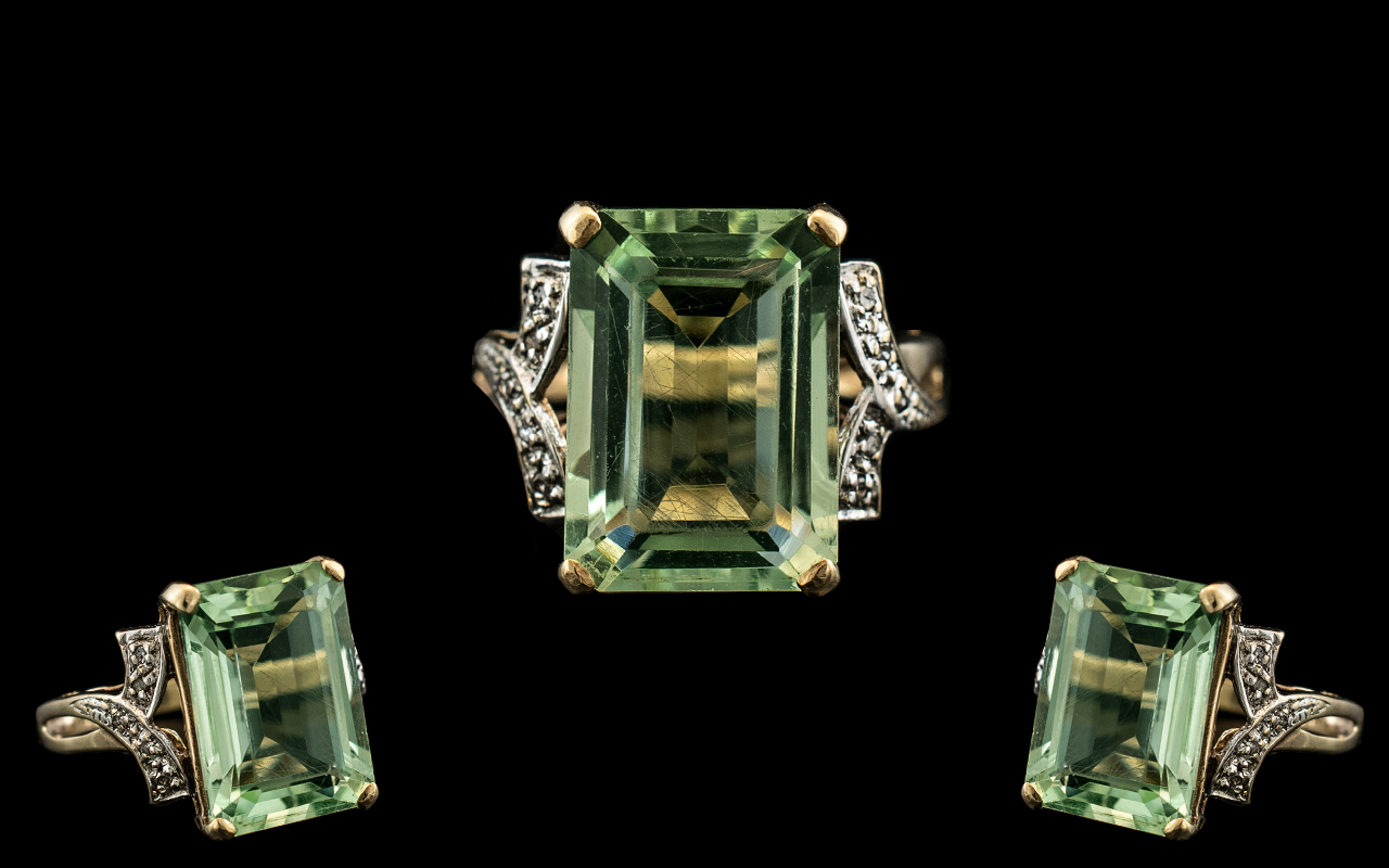 Ladies 9ct Gold Attractive Single Stone Aquamarine Set Dress Ring with Diamond Set Shoulders.