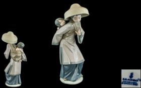 Lladro Hand Painted Porcelain Figure ' My Precious Bundle ' Model No 5123. Issued 1982 - 1998.