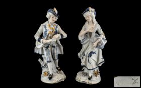 Pair of German Decorated Bisque Figures, the gentleman courting and serenading the lady. 13" high.