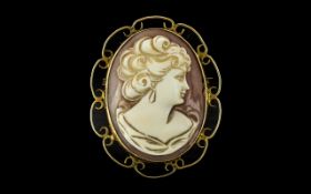 A 9ct Gold - Open Worked Mounted Shell Cameo / Brooch, With Central Carved Image of a Young Woman.