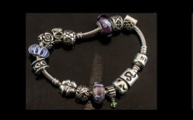 Pandora Bracelet. Bracelet with Numerous Charms.