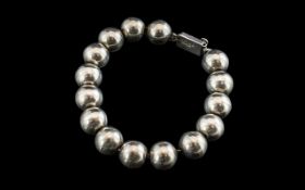 Large Chunky Silver Statement Bracelet of Large Pebble Form.