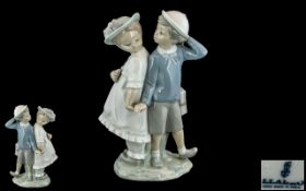 Lladro - Hand Painted Porcelain Figure ' Puppy Love ' Model No 1127. Issued 1971 - 1996. Height 10.