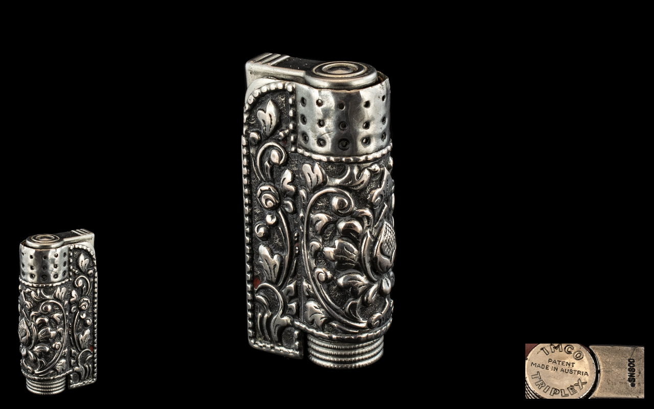 Silver Austrian Lighter. Silver Lighter Highly Decorated Throughout In Flowers and Foliage.