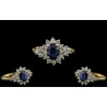 18ct Gold - Attractive Diamond and Sapphire Set Dress Ring.