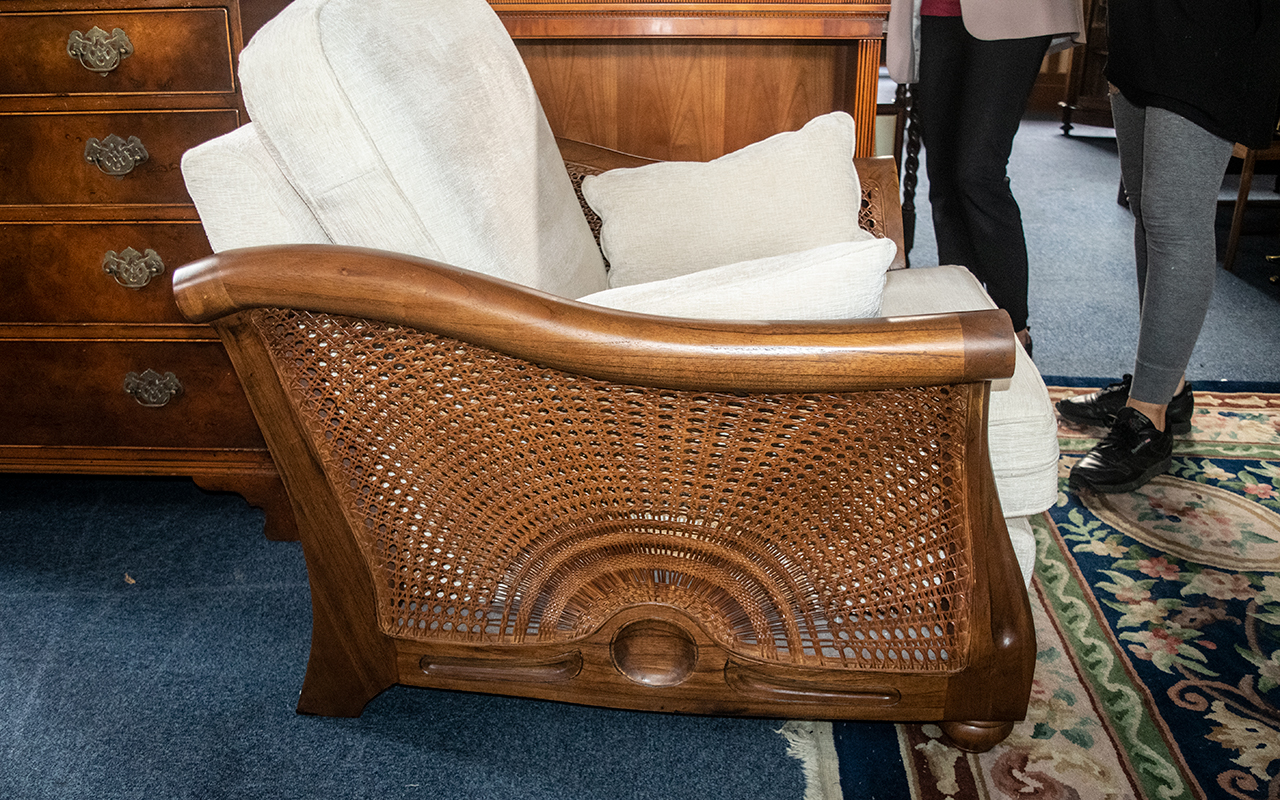 A Large Teak Framed Bergere Upholstered Armchair with Loose Cushion of Contemporary Shape. - Image 2 of 2