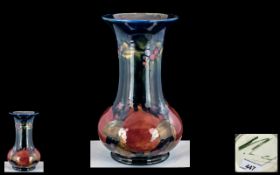 William Moorcroft Signed Long Necked Bulbous Shaped Vase ' Pomegranate / Berries Design. c.1920's.