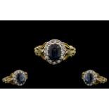 Antique Period - Attractive 18ct Gold and Platinum Diamond and Blue Sapphire Set Cluster Ring. The