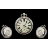 A Victorian Silver Open Faced Pocket Watch, white enamel dial, Roman Numerals with subsidiary