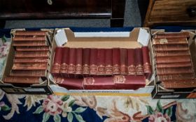 Charles Dickens Books, comprising two complete sets of works, in burgundy hard covers,