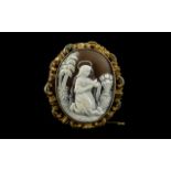 A Fine Quality Antique Oval Shaped Devotional Carved Cameo Depicting a Lady Saint or Mary Reading