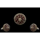 A Vintage - Excellent Quality Sterling Silver Garnet and Marcasite Set Statement Ring.