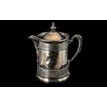 Large American Silver Plated Iced Water Jug with a Shaped Spout and Beaten Body Pattern with