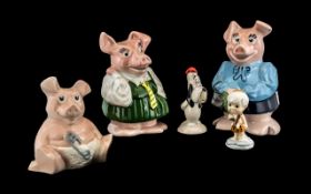 Three Money Boxes and Two Small Porcelain Figures comprising of,