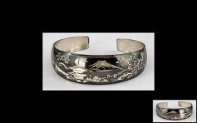 Japanese Silver Bangle with Temple and Mountain Decoration. Hallmarked for Silver.