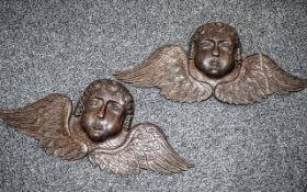 Pair of Antique Carved Oak Flemish Appliques depicting cherub heads sporting wings,